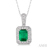 6x4 MM Emerald Shape Emerald and 1/5 Ctw Round Cut Diamond Pendant in 14K White Gold with Chain